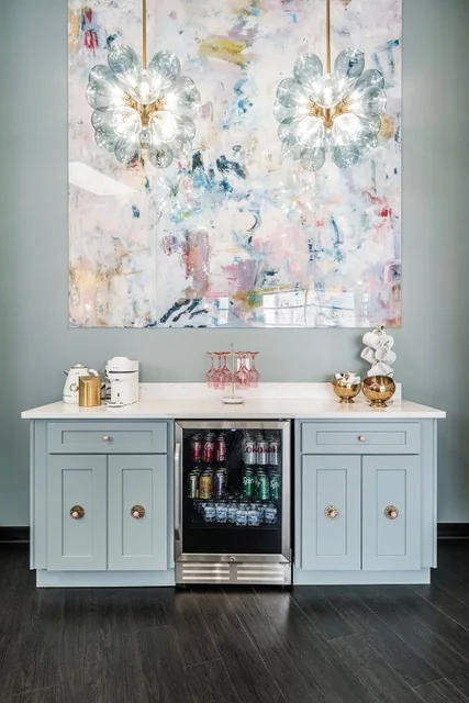 Pastel LUCiTE art panel above a bar cabinet at OA Salon